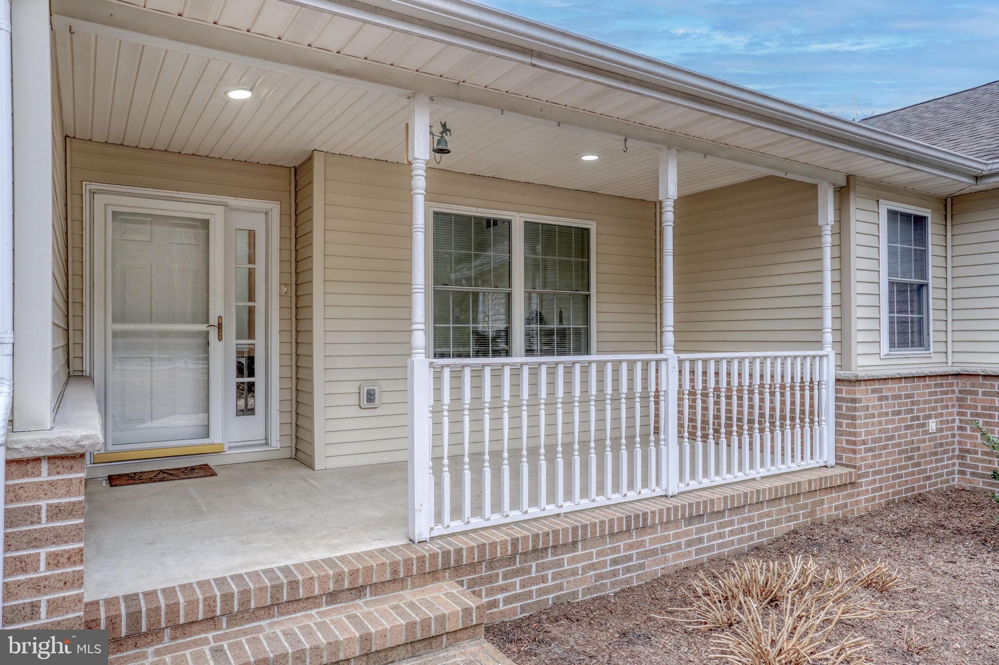 10821 Shawnee Road Harrington, DE 19952 - Photo 5 of 53 a view of a house with a door and wooden floor