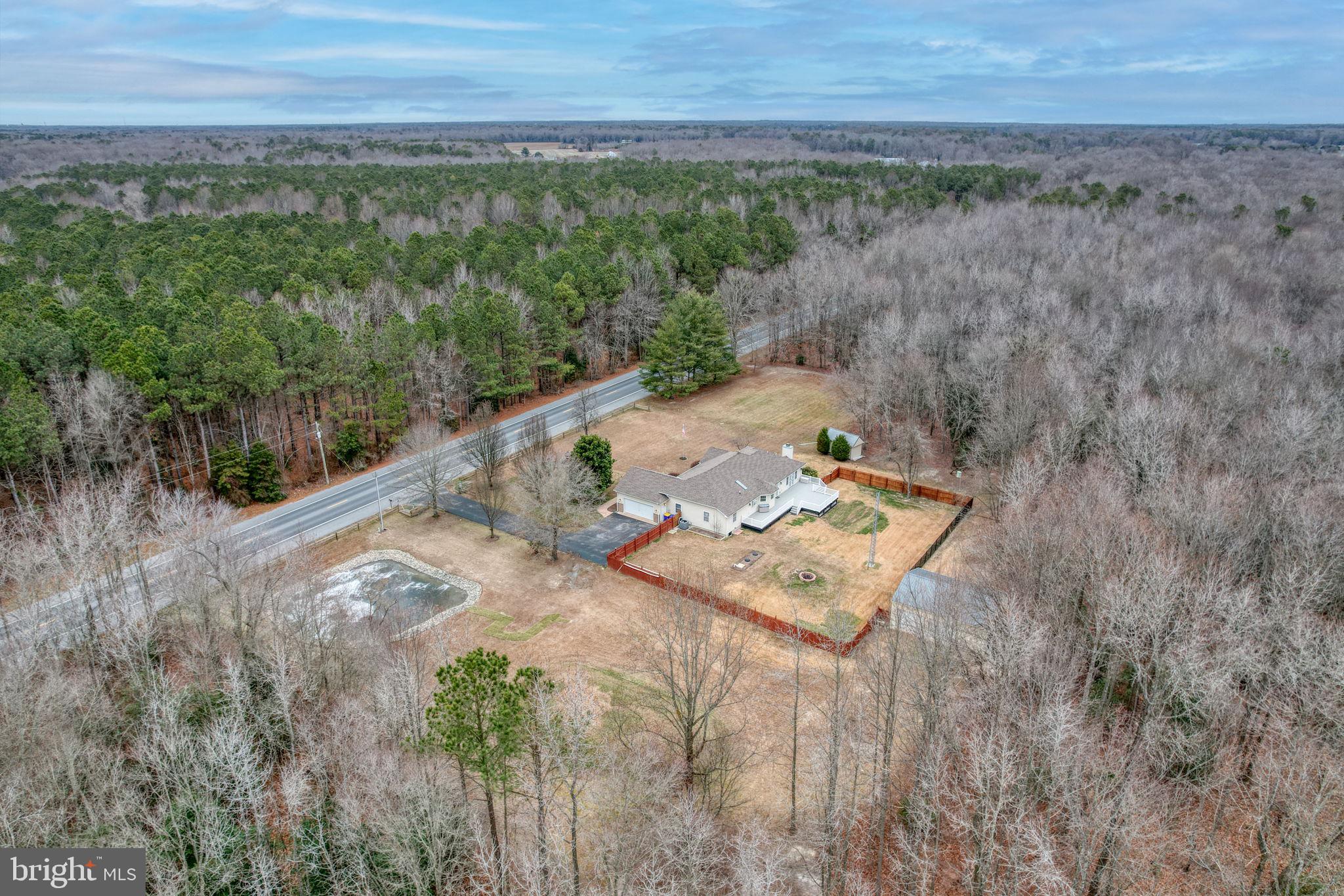 10821 Shawnee Road Harrington, DE 19952 - Photo 52 of 53 a view of a yard with an outdoor space