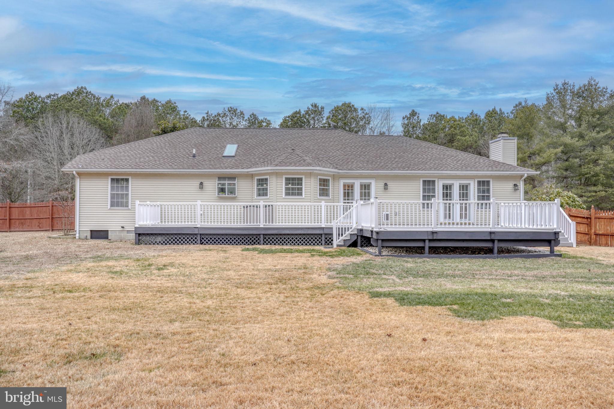10821 Shawnee Road Harrington, DE 19952 - Photo 9 of 53 a view of a house with a ocean view