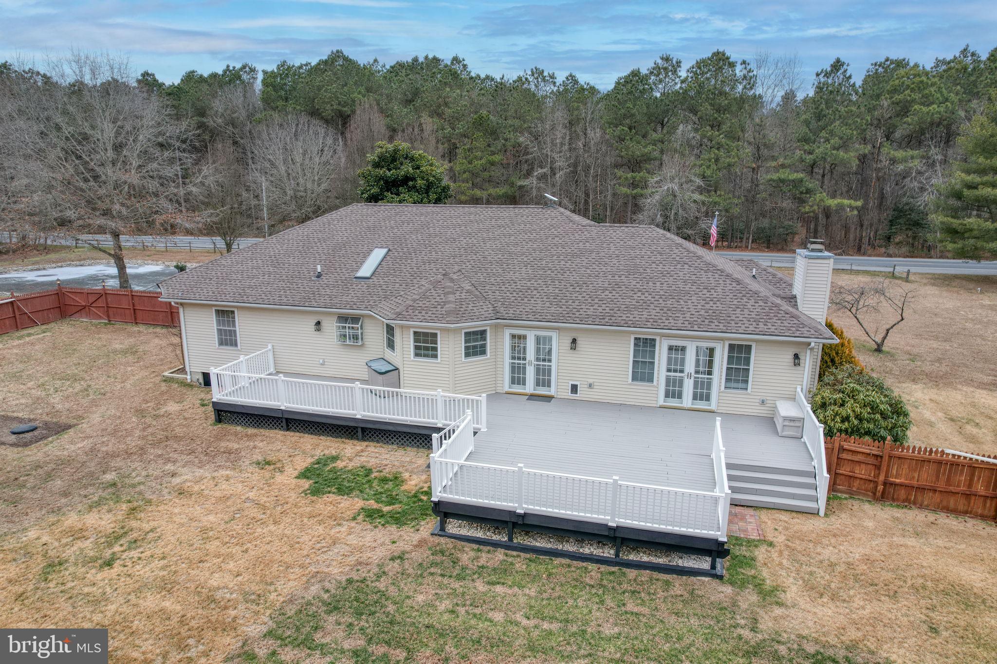 10821 Shawnee Road Harrington, DE 19952 - Photo 10 of 53 an aerial view of a house with a yard