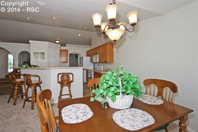 11902 Rio Secco Road Peyton, CO 80831 - Photo 6 of 23 Dining Nook into Kitchen