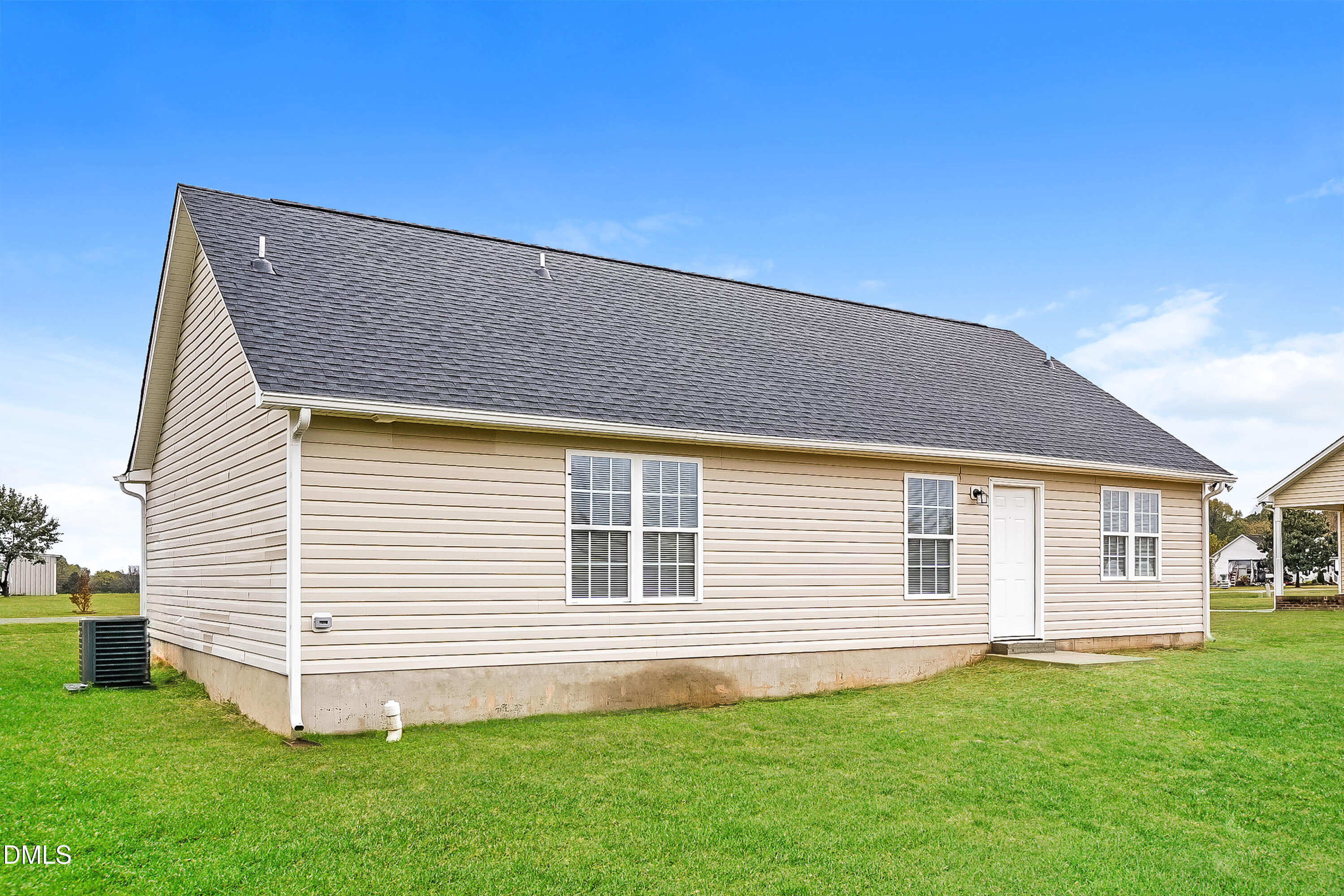 77 Jethro Circle Smithfield, NC 27577 - Photo 15 of 16 a backyard of a house with lots of green space