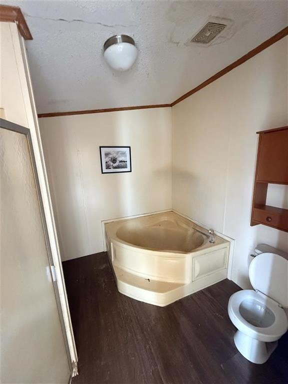 198 East 4th Street Crawford, TX 76638 - Photo 11 of 24 a bathroom with a sink and a mirror