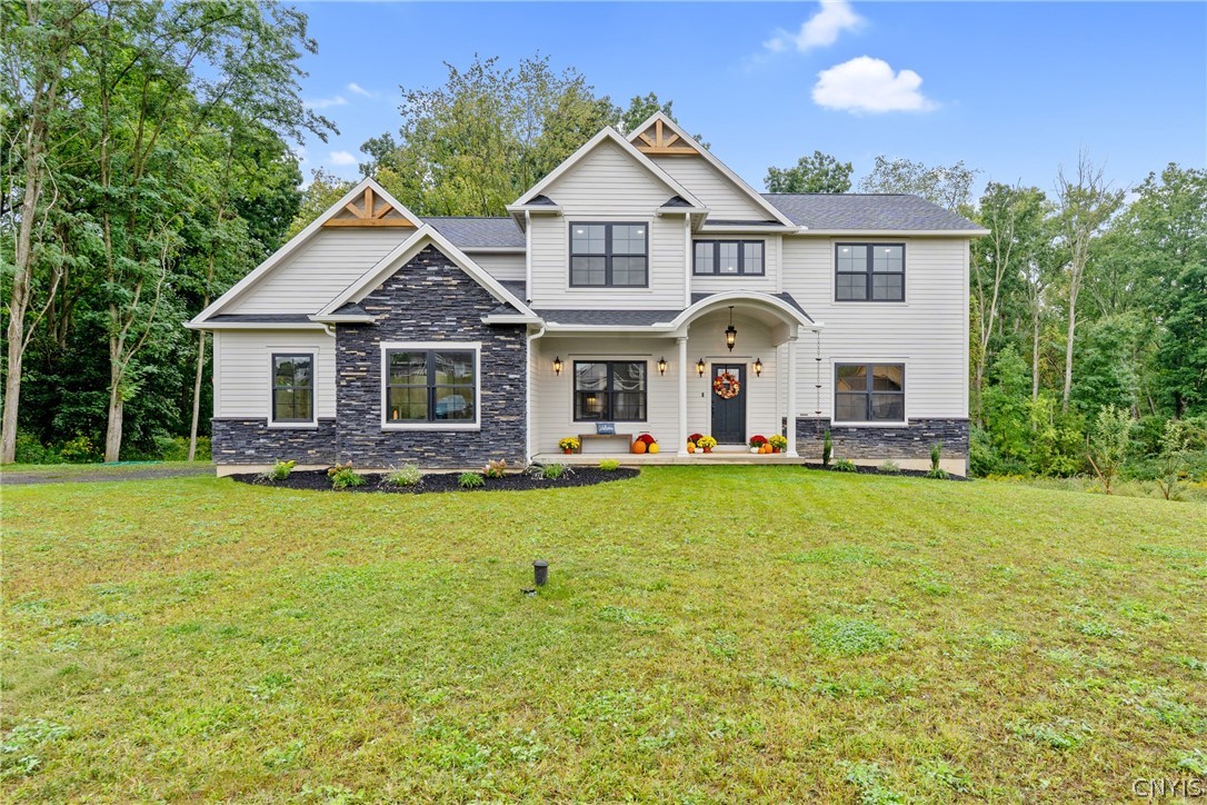 2020 Rubicon Road Lysander, NY 13027 - Photo 1 of 49 Welcome to this sleek, custom-designed masterpiece by premier builder Ron Merle, perfectly nestled within the coveted Whispering Oaks.