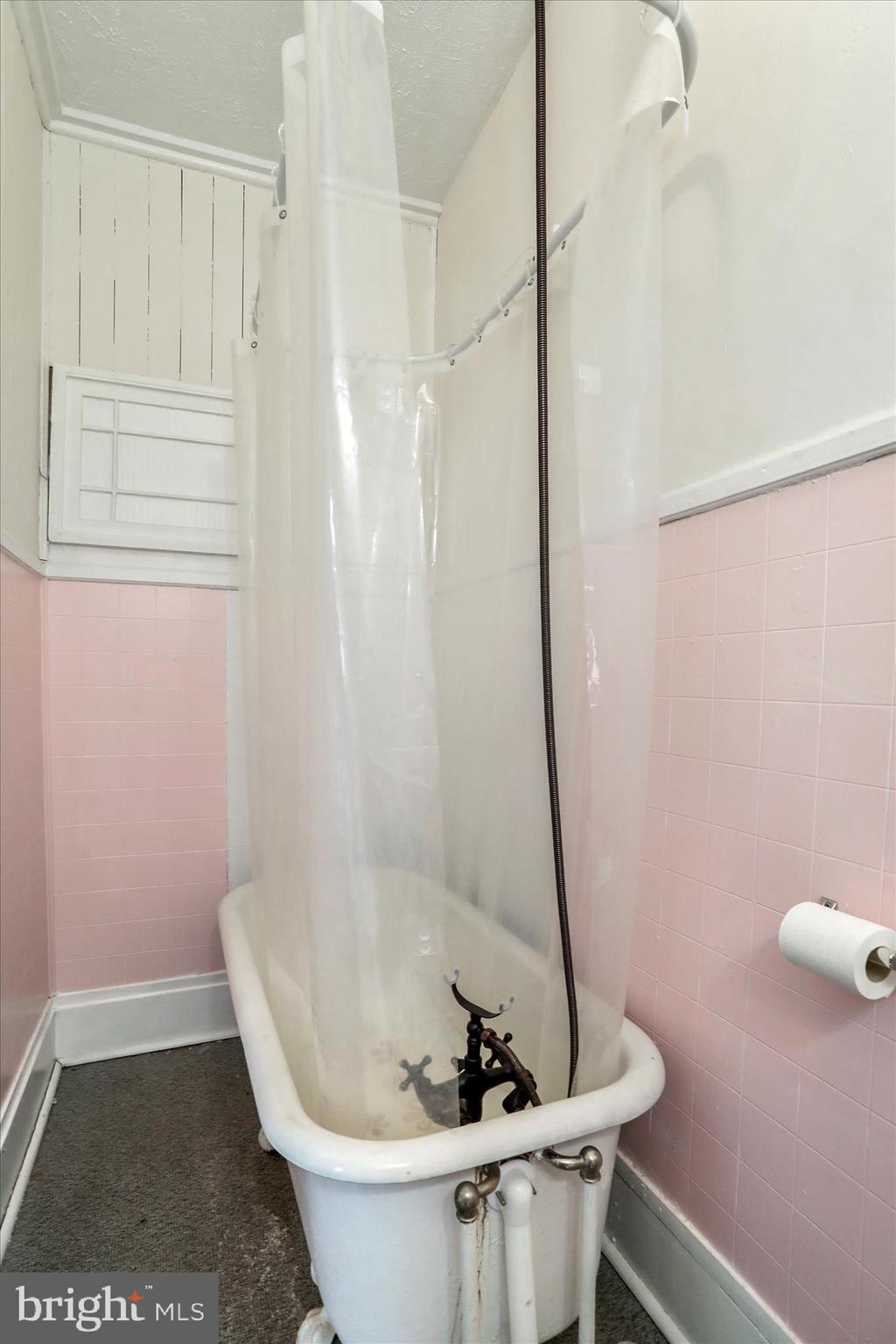 287 East Main Street Romney, WV 26757 - Photo 33 of 48 a white bath tub sitting in a bathroom