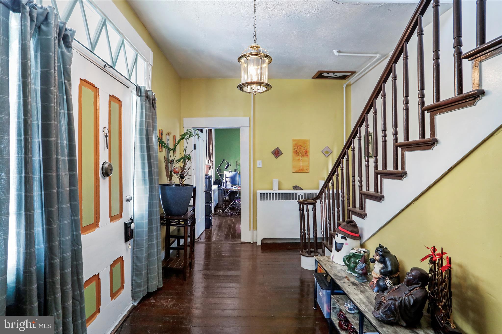 287 East Main Street Romney, WV 26757 - Photo 7 of 48 a view of entryway and hall with wooden floor