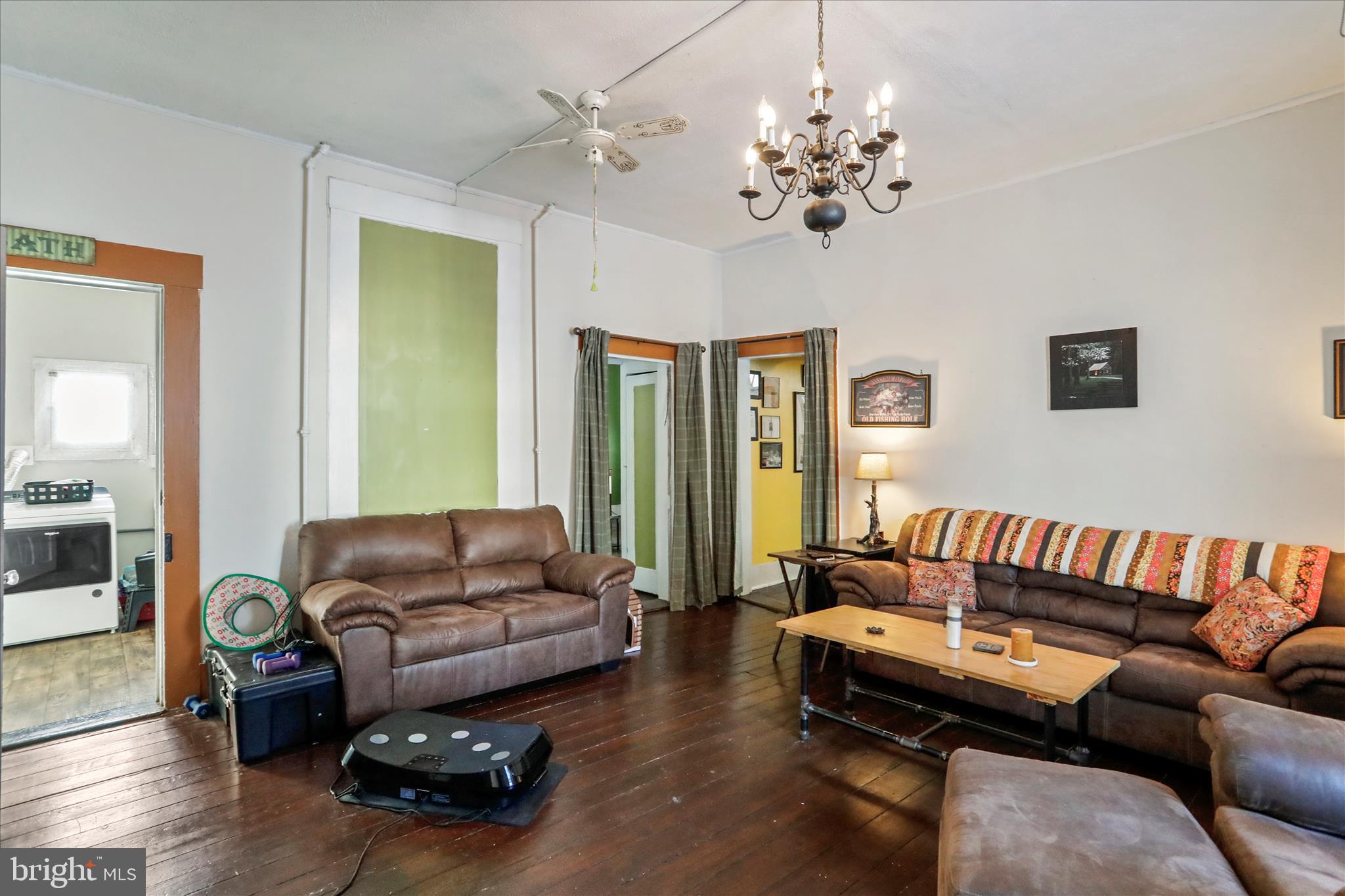 287 East Main Street Romney, WV 26757 - Photo 10 of 48 a living room with furniture or couch and a chandelier