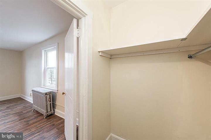 215 Bridge Street, Unit B Phoenixville, PA 19460 - Photo 17 of 31 a view of a hallway with wooden floor and closet