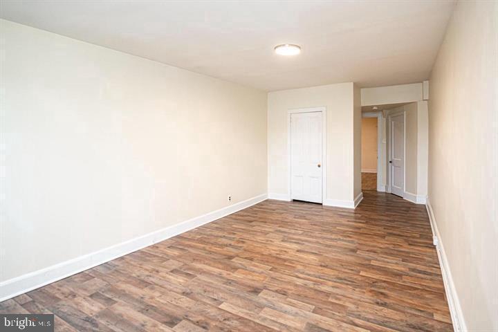 215 Bridge Street, Unit B Phoenixville, PA 19460 - Photo 25 of 31 a view of empty room with wooden floor