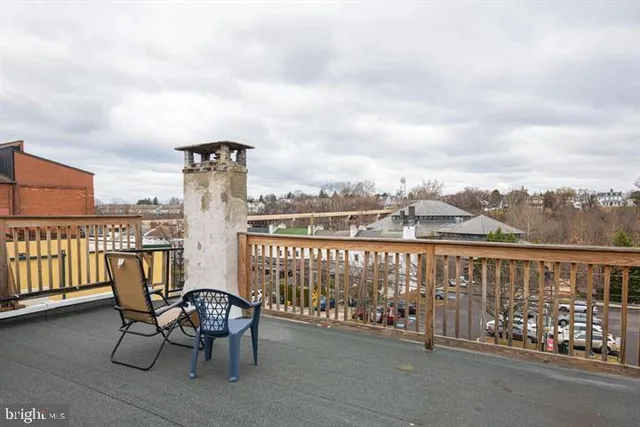 a view of a balcony with city view