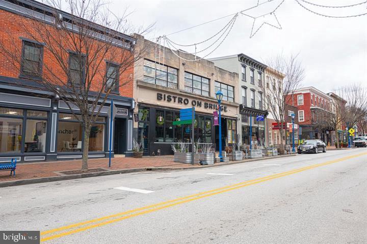 215 Bridge Street, Unit B Phoenixville, PA 19460 - Photo 3 of 31 front view of a building with a street