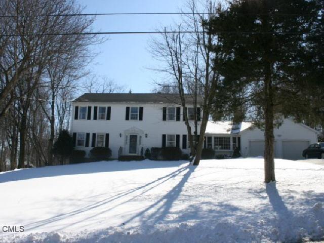 64 Firehouse Road Trumbull, CT 06611 - Photo 1 of 1 a view of a house with snow on the road