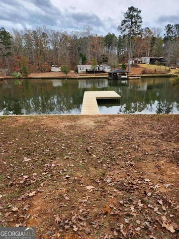 a view of a lake in middle of a town