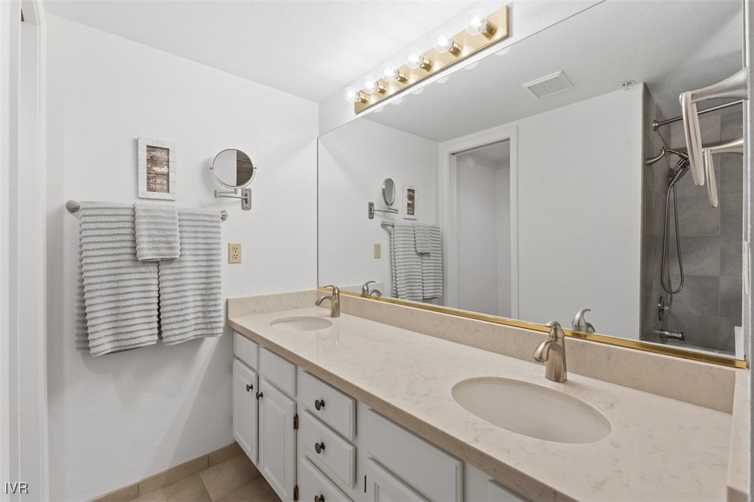 400 Fairview Boulevard, Unit 86 Incline Village, NV 89451 - Photo 25 of 36 a bathroom with a sink and a mirror