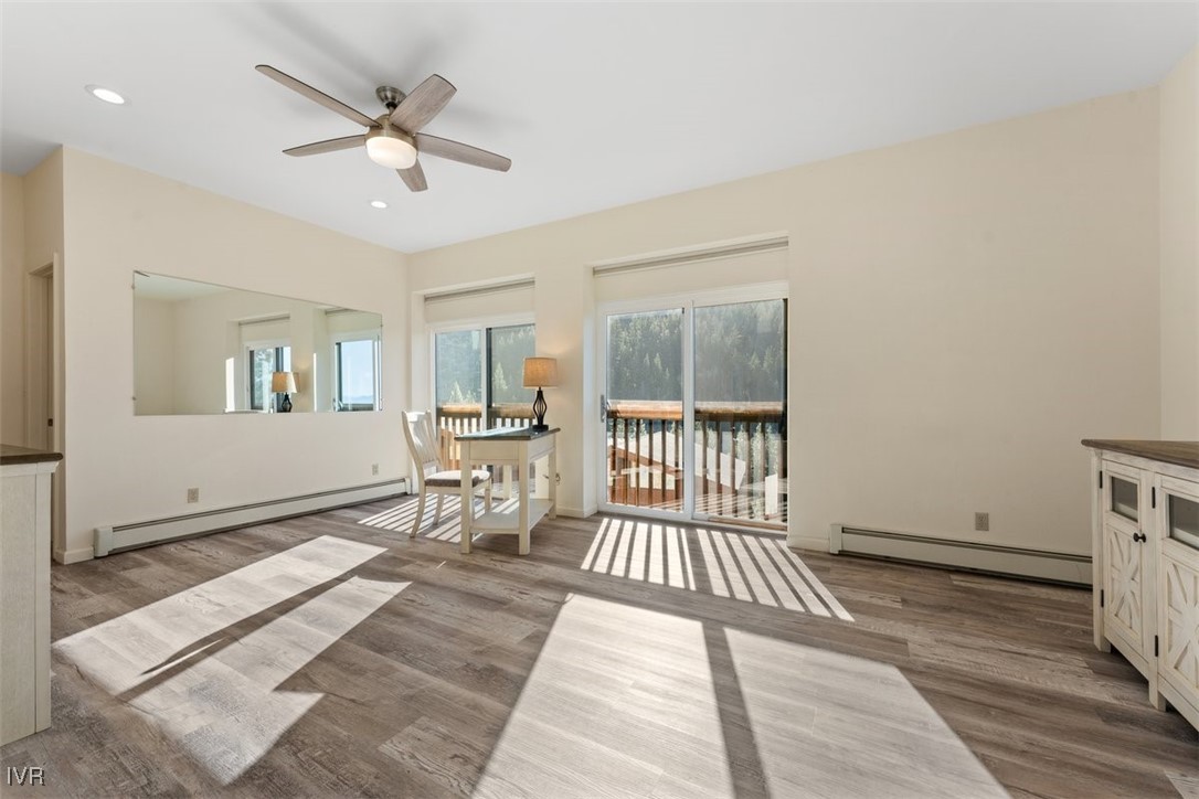 400 Fairview Boulevard, Unit 86 Incline Village, NV 89451 - Photo 26 of 36 a view of a livingroom with wooden floor and a ceiling fan