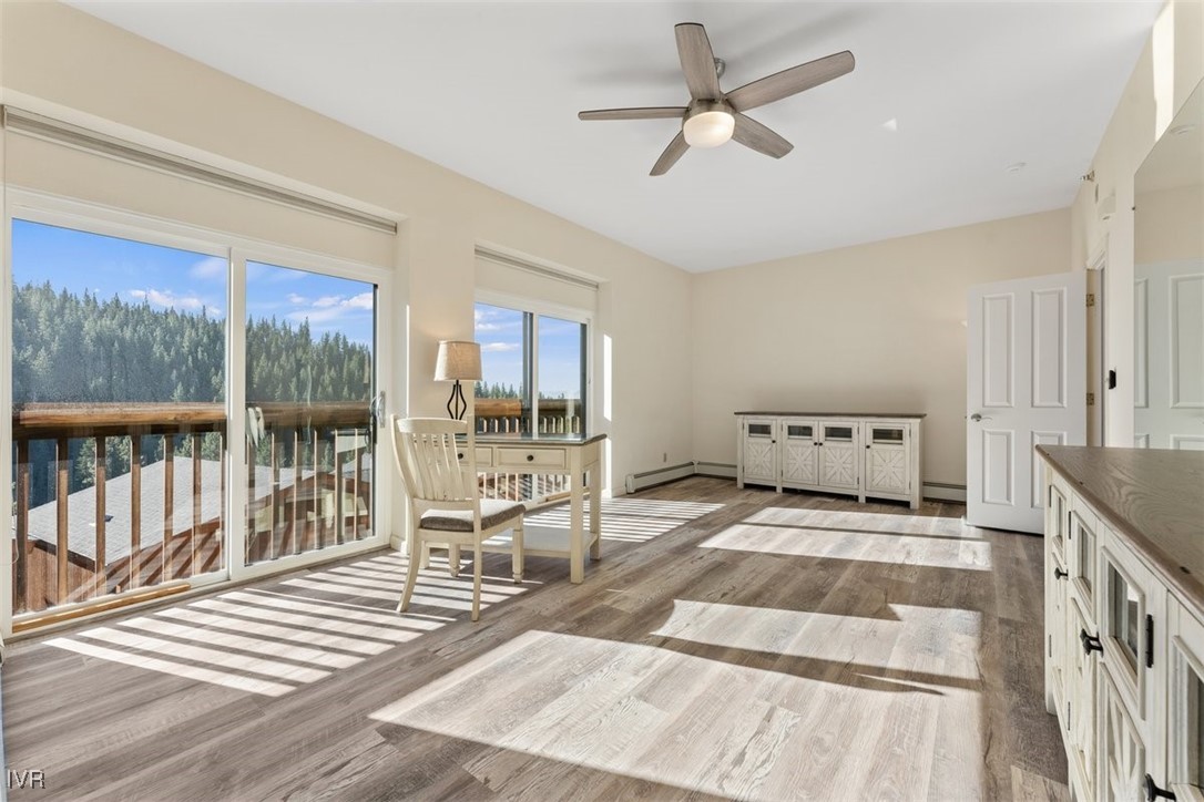 400 Fairview Boulevard, Unit 86 Incline Village, NV 89451 - Photo 27 of 36 a bedroom with a bed and large windows