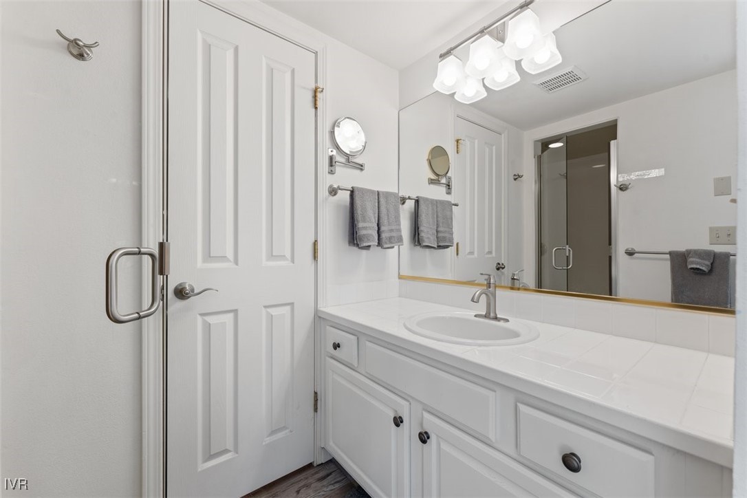 400 Fairview Boulevard, Unit 86 Incline Village, NV 89451 - Photo 29 of 36 a bathroom with a double vanity sink and a mirror