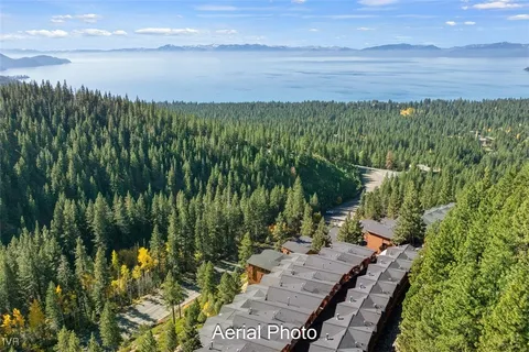 a view of a garden with an outdoor space and seating area