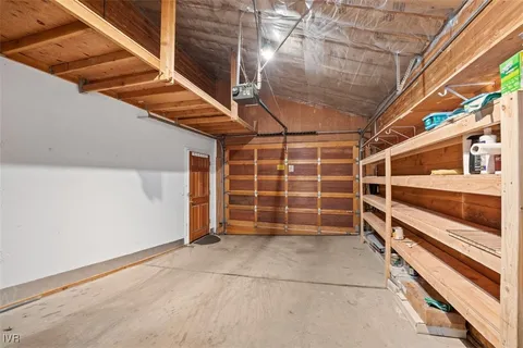 a view of an empty room with stairs