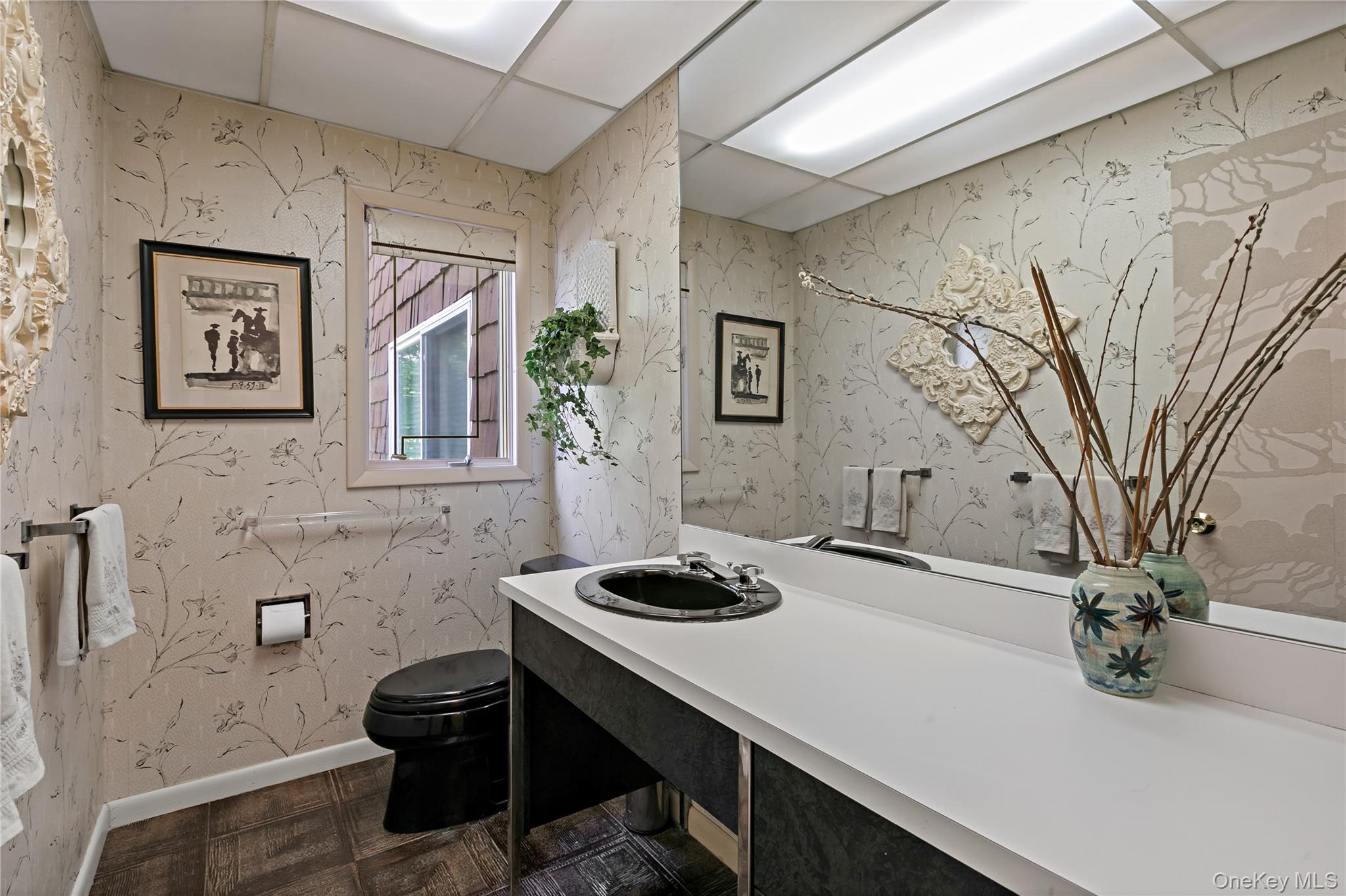 16 Meadow Road Scarsdale, NY 10583 - Photo 16 of 47 a room with a sink and cabinets