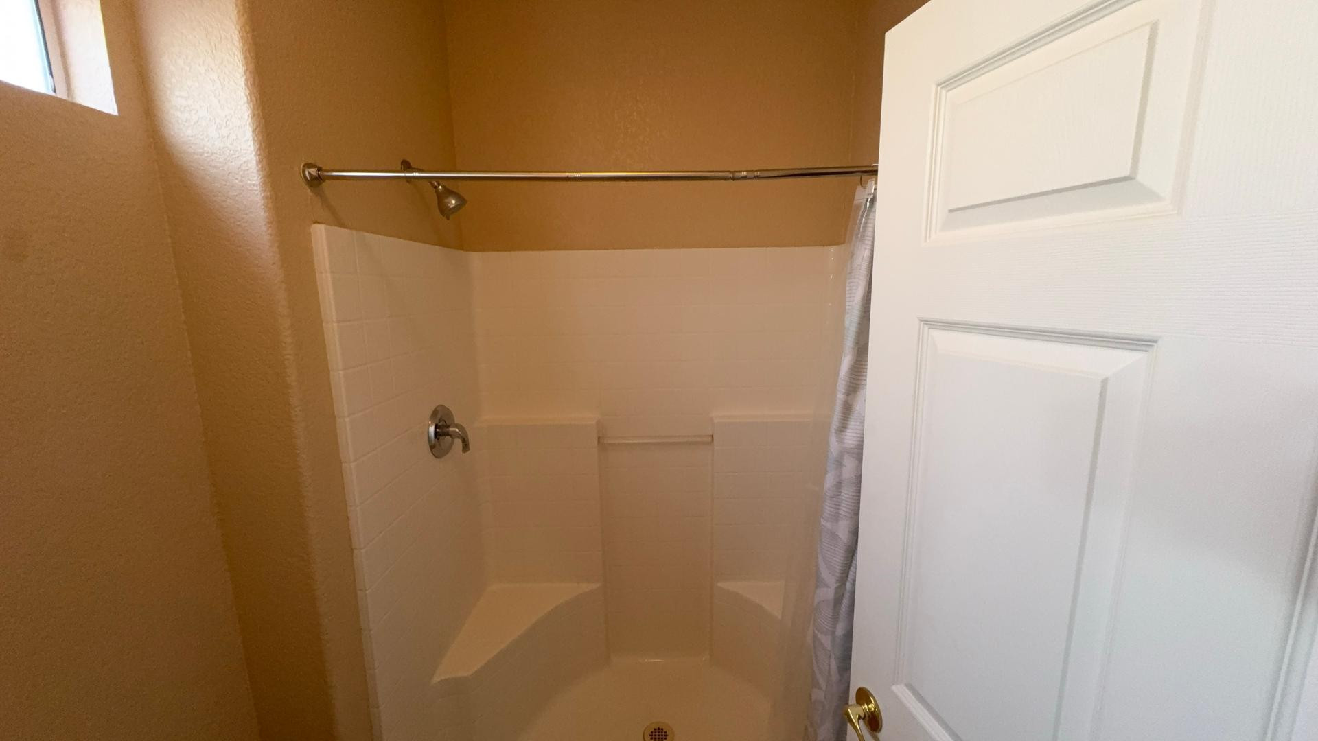 2101 South Yellow Wood, Unit 45 Mesa, AZ 85209 - Photo 5 of 10 a bathroom with a shower