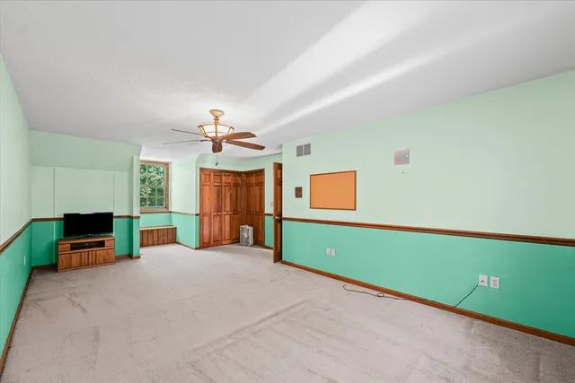 a view of a chairs and tables in patio