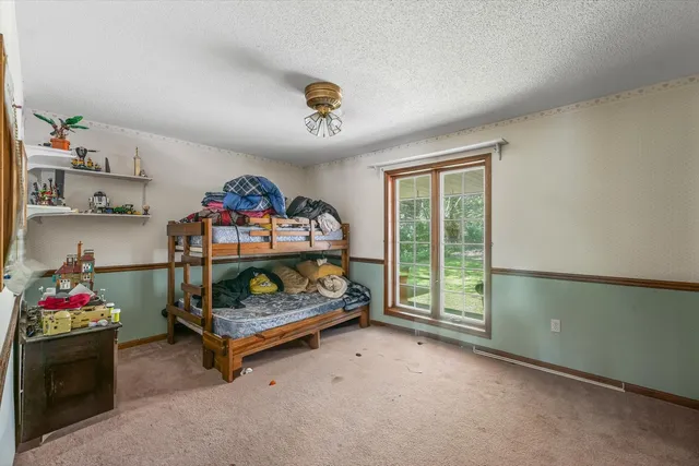 a view of yard with grass and a trees