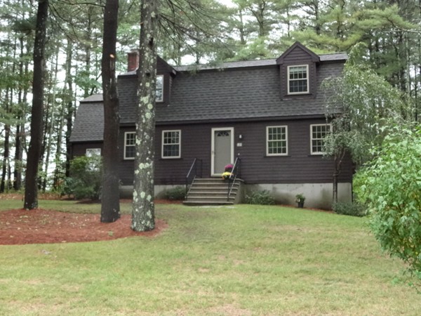 25 Green Valley Road Medway, MA 02053 - Photo 1 of 30 a brick house that has a tree in front of it