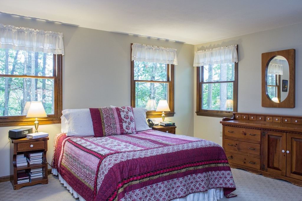 25 Green Valley Road Medway, MA 02053 - Photo 26 of 30 a bedroom with a large bed and a windows