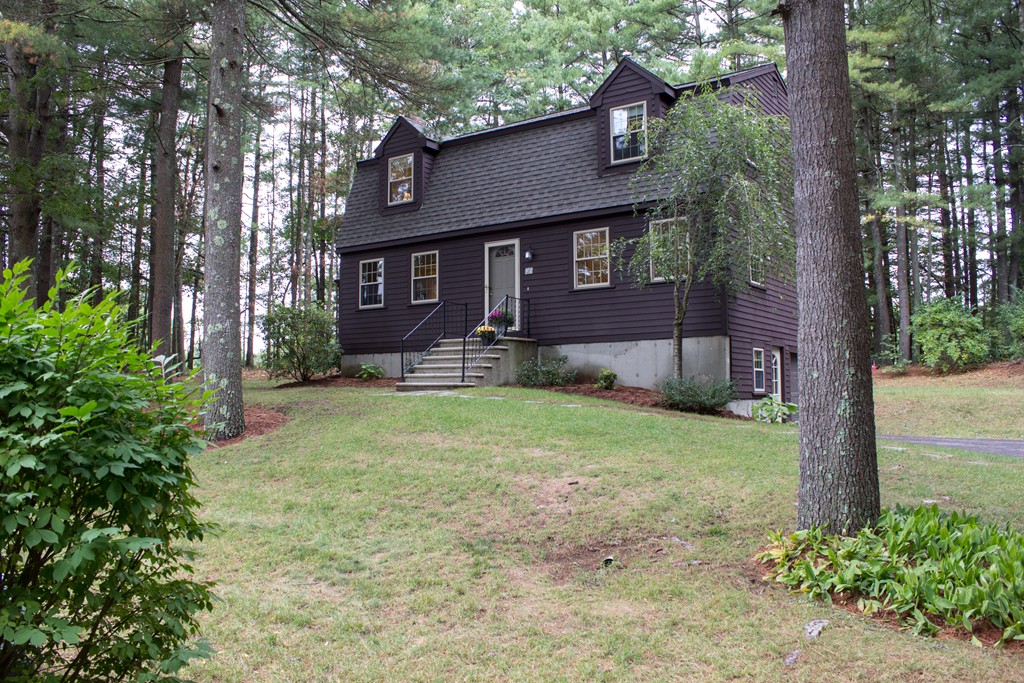 25 Green Valley Road Medway, MA 02053 - Photo 5 of 30 a front view of a house with garden