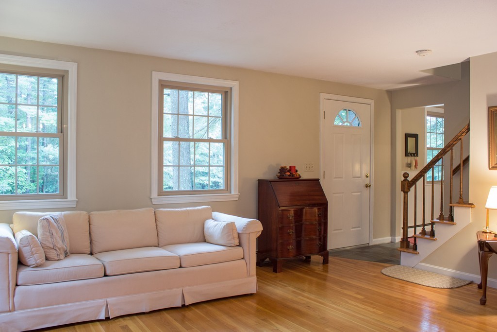 25 Green Valley Road Medway, MA 02053 - Photo 9 of 30 a living room with furniture and a window