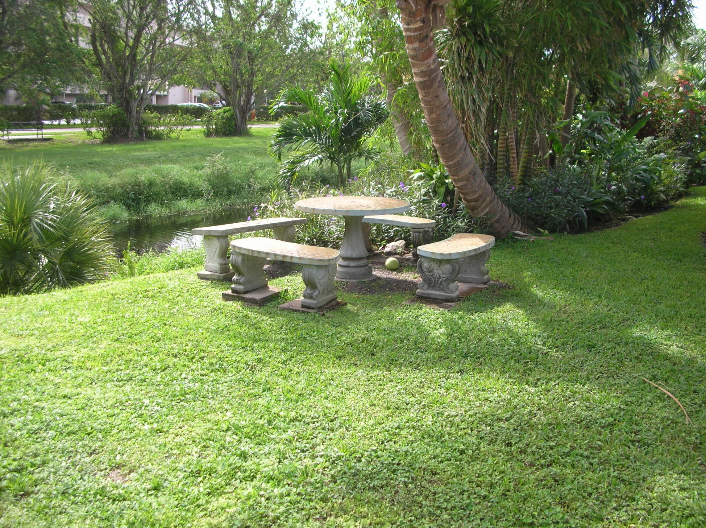 228 Northwest 69th Street Boca Raton, FL 33487 - Photo 31 of 31 a view of a backyard with a garden and plants