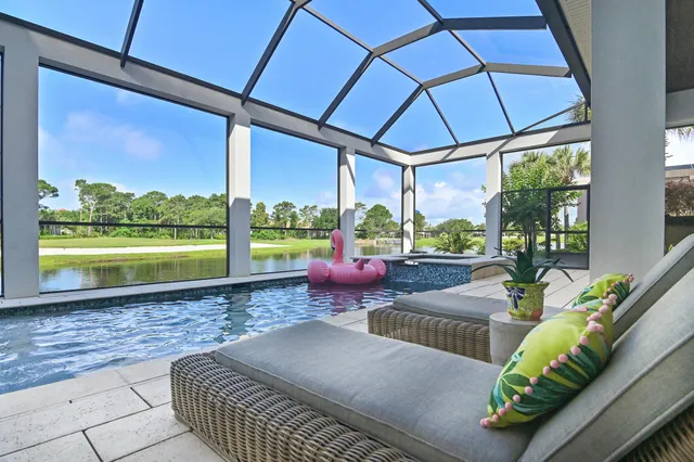 a view of a patio with couches chairs dining table and chairs