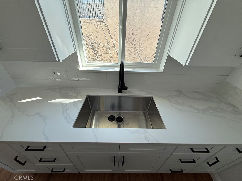 7159 Greeley Street, Unit F Tujunga, CA 91042 - Photo 3 of 15 a kitchen with a sink and a window