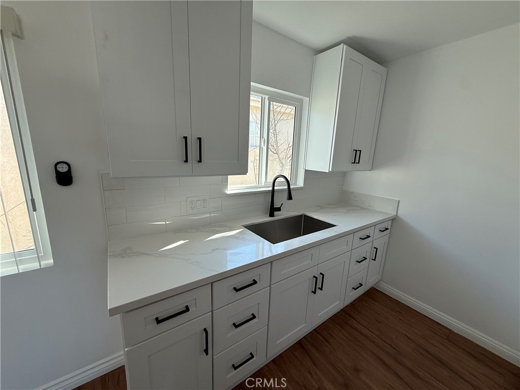 7159 Greeley Street, Unit F Tujunga, CA 91042 - Photo 4 of 15 a kitchen with sink and window