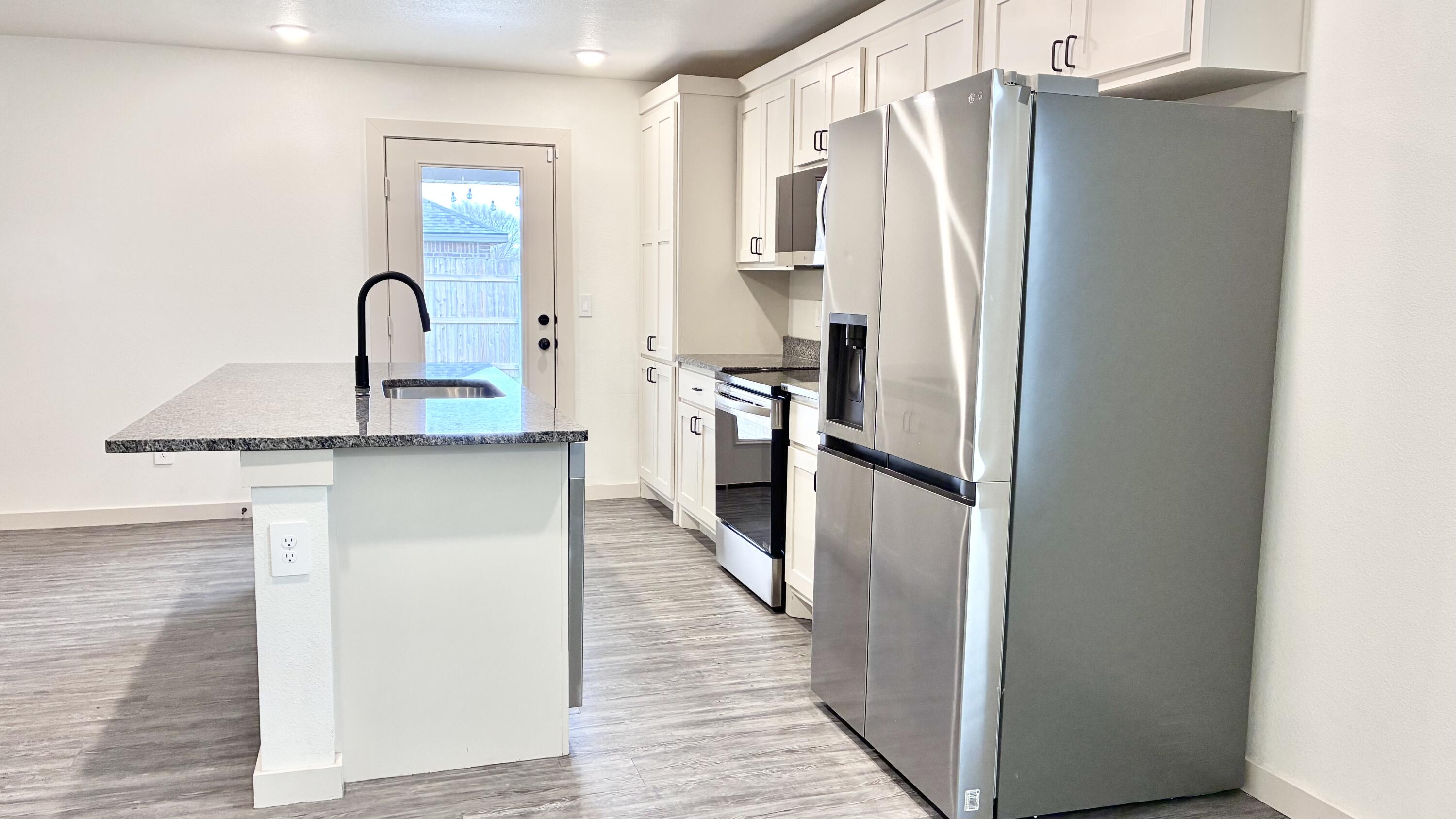 7705 Date Avenue Lubbock, TX 79404 - Photo 7 of 22 IMG_5540