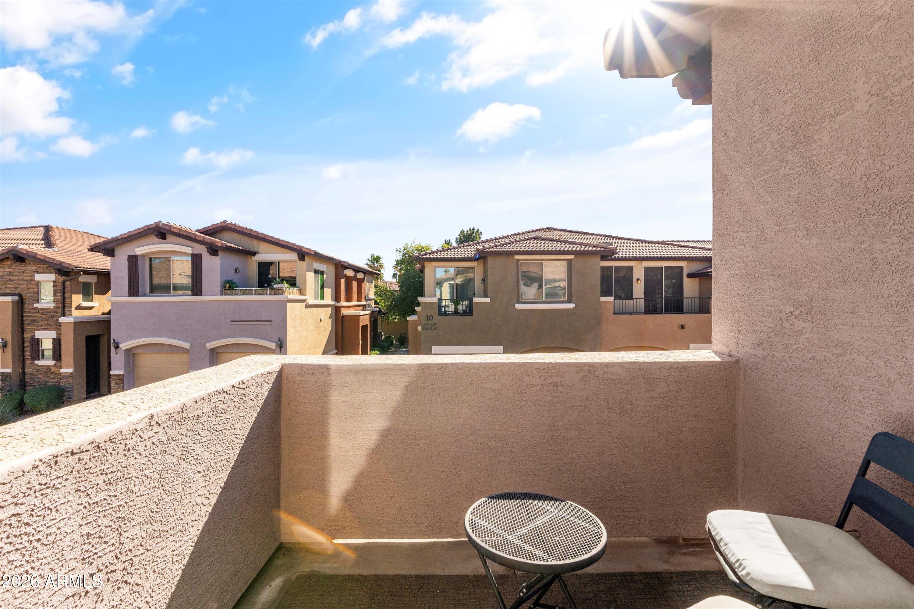7726 East Baseline Road, Unit 247 Mesa, AZ 85209 - Photo 13 of 29 a view of a house with roof deck