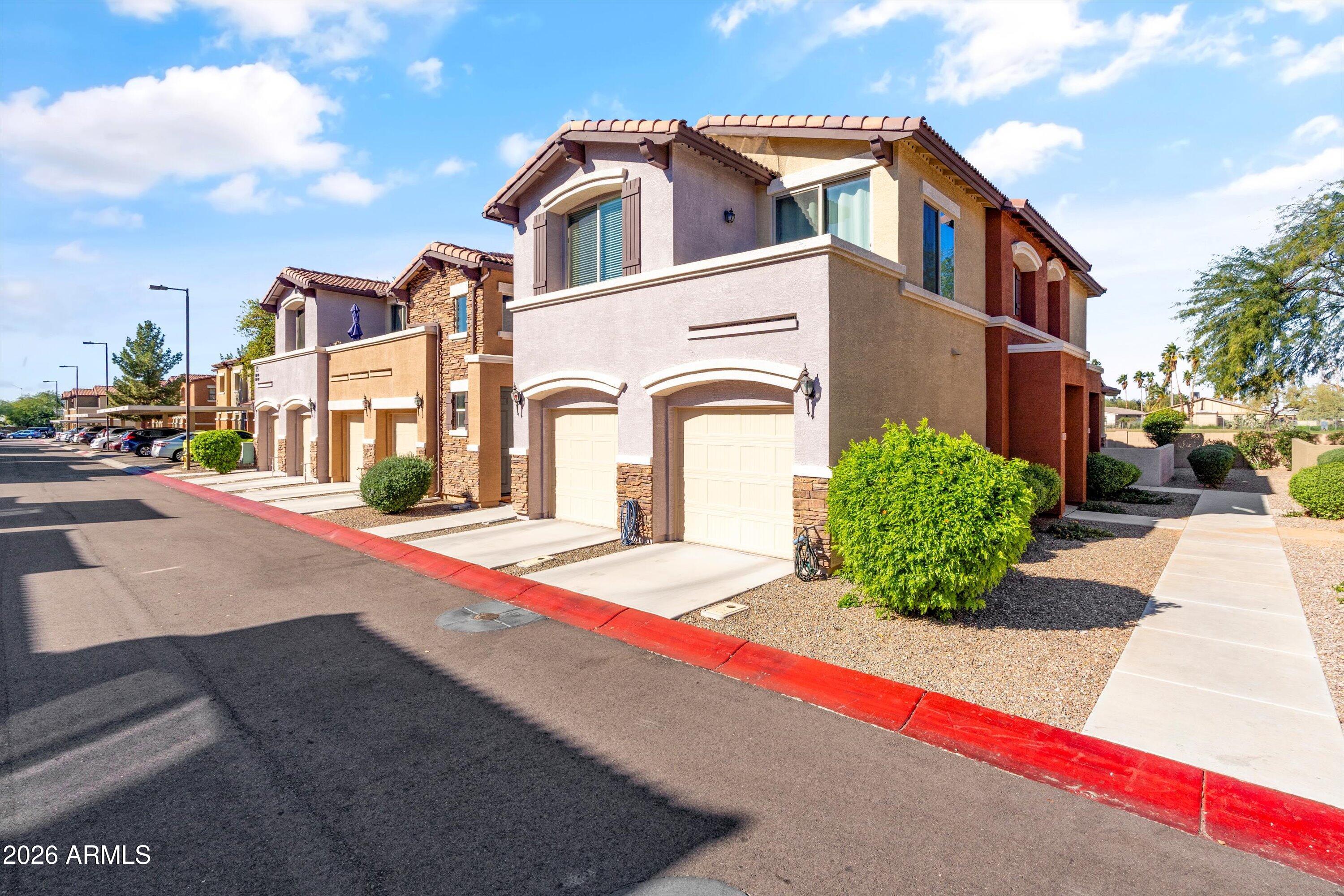 7726 East Baseline Road, Unit 247 Mesa, AZ 85209 - Photo 2 of 29 a front view of a multi story residential apartment building