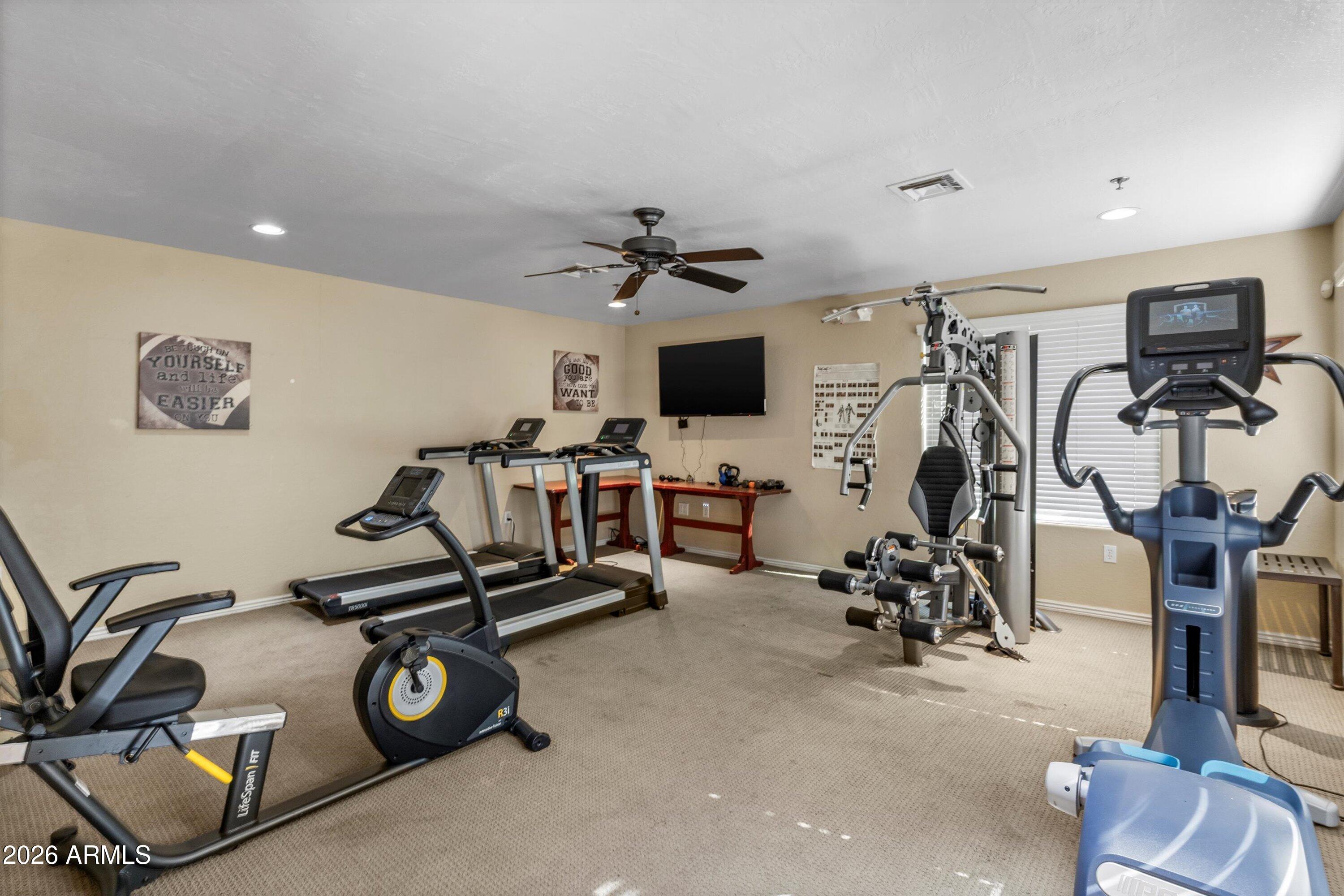 7726 East Baseline Road, Unit 247 Mesa, AZ 85209 - Photo 22 of 29 a view of a room with gym equipment