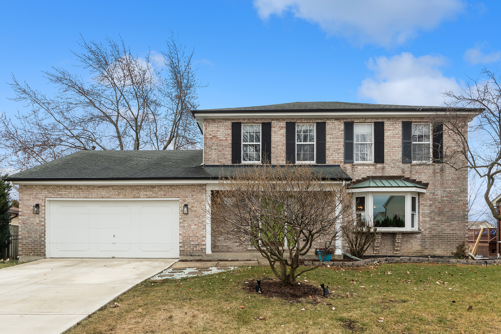 1813 Newport Road Downers Grove, IL 60516 - Photo 1 of 23 a front view of a house with a yard