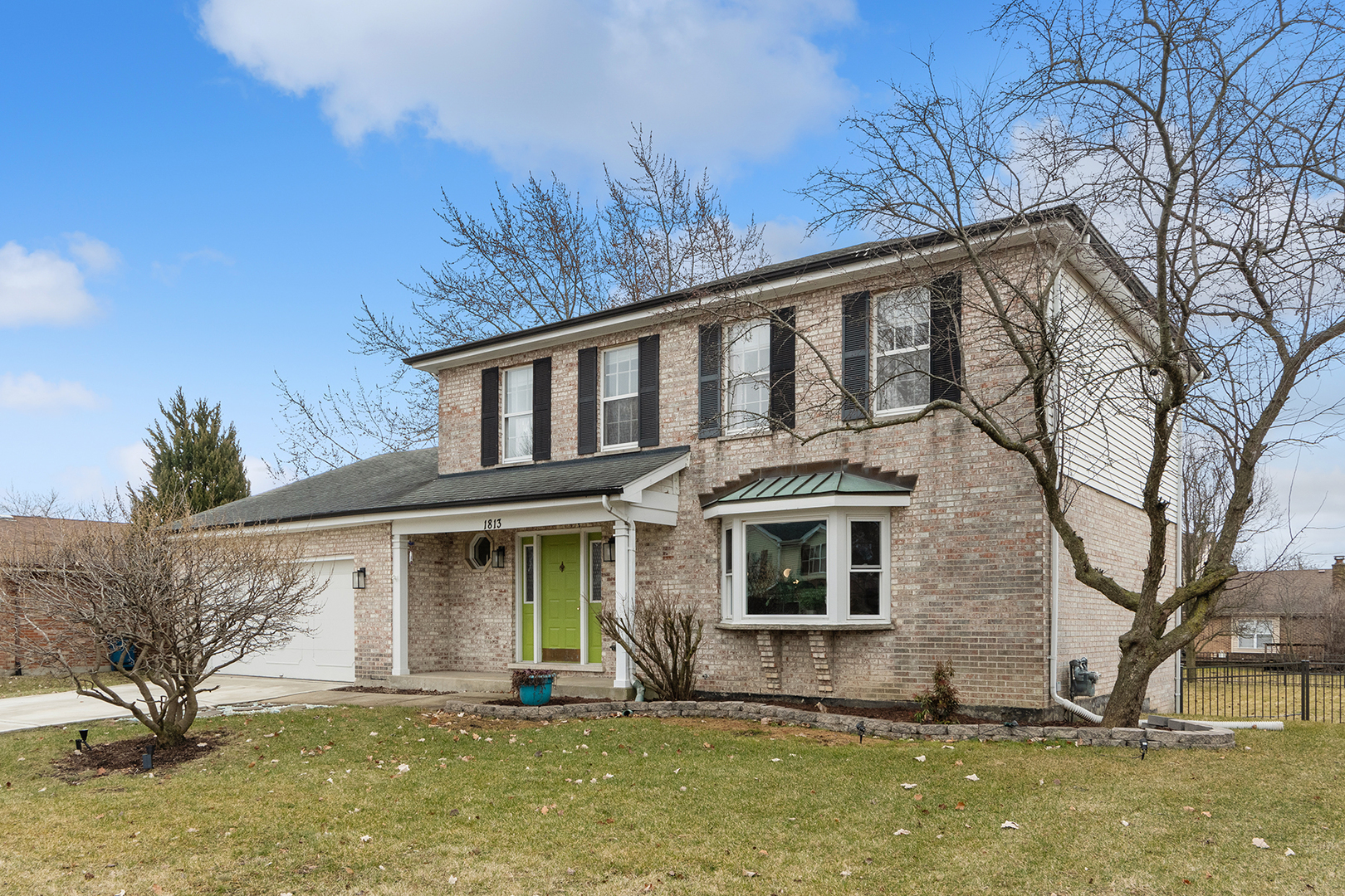 1813 Newport Road Downers Grove, IL 60516 - Photo 2 of 23 a front view of a house with yard