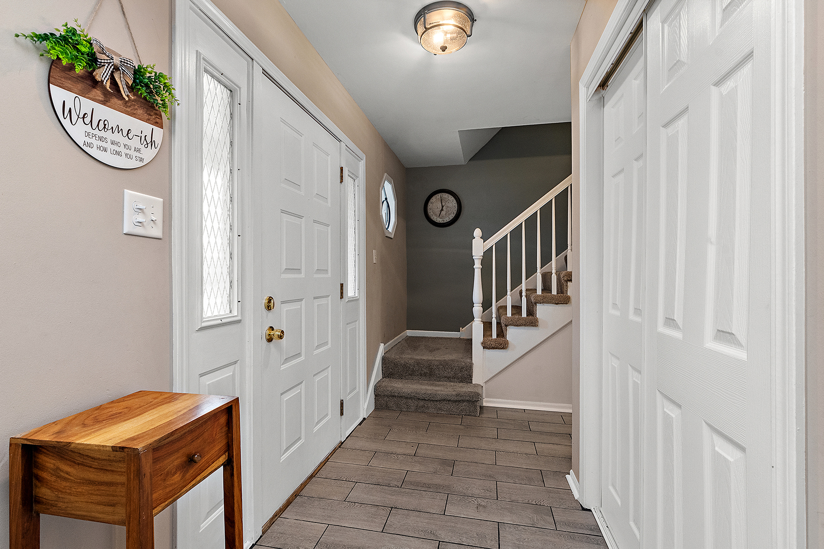 1813 Newport Road Downers Grove, IL 60516 - Photo 3 of 23 a view of front door with hallway and stairs