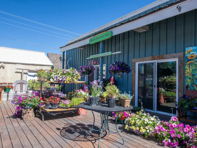 a dining room with furniture and a chandelier