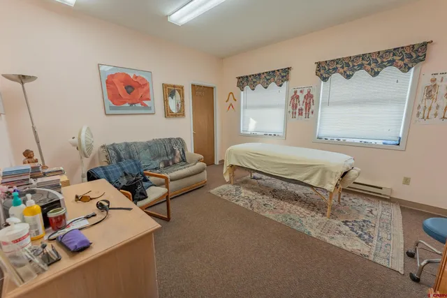 a room with stairs and a wooden floors