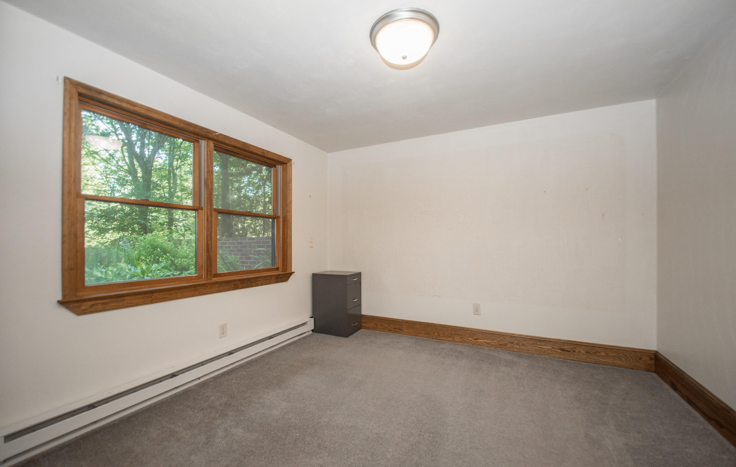 2524 Blue Ridge Springs Road Blue Ridge, VA 24064 - Photo 24 of 44 an empty room with a window