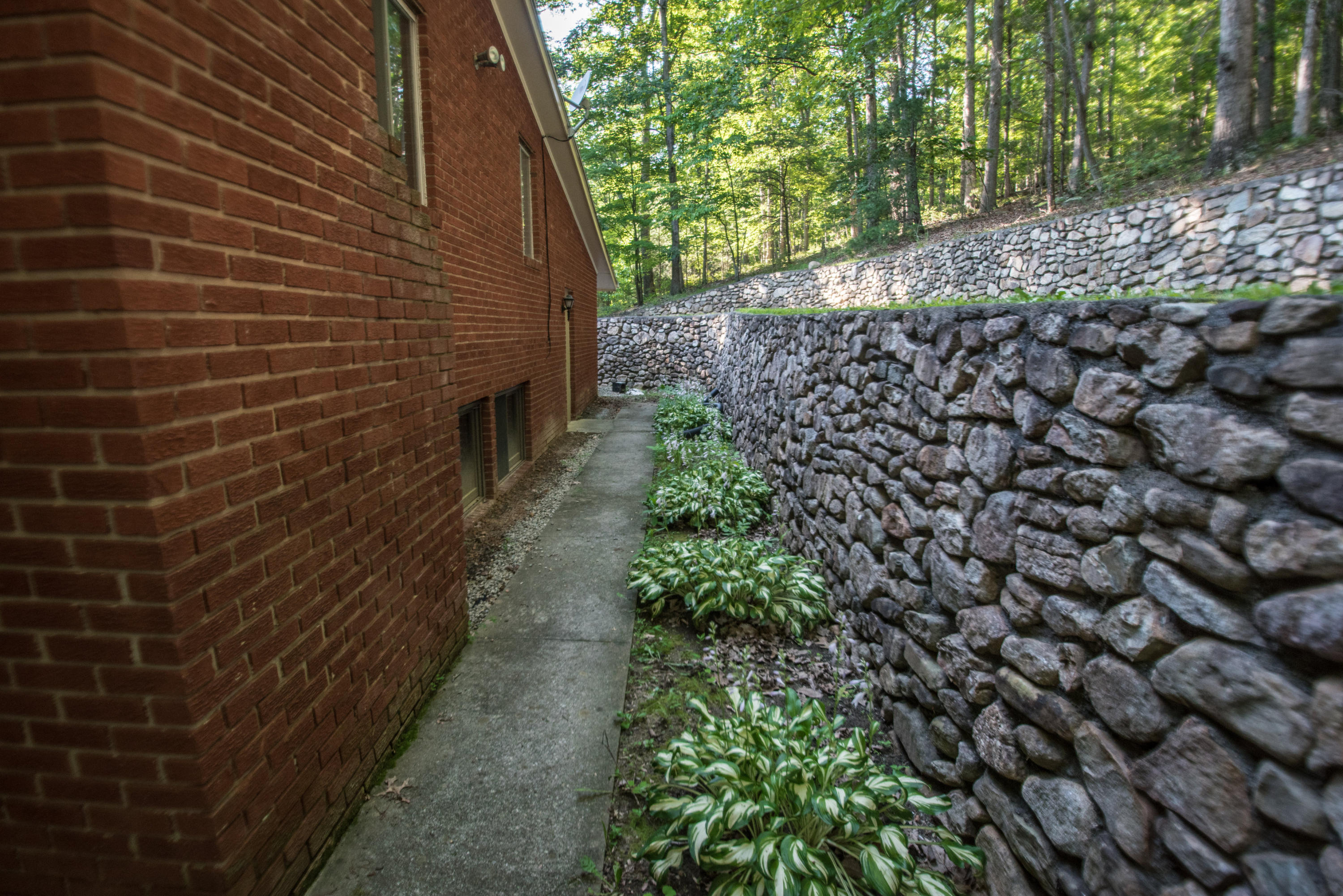 2524 Blue Ridge Springs Road Blue Ridge, VA 24064 - Photo 43 of 44 a pathway between two buildings