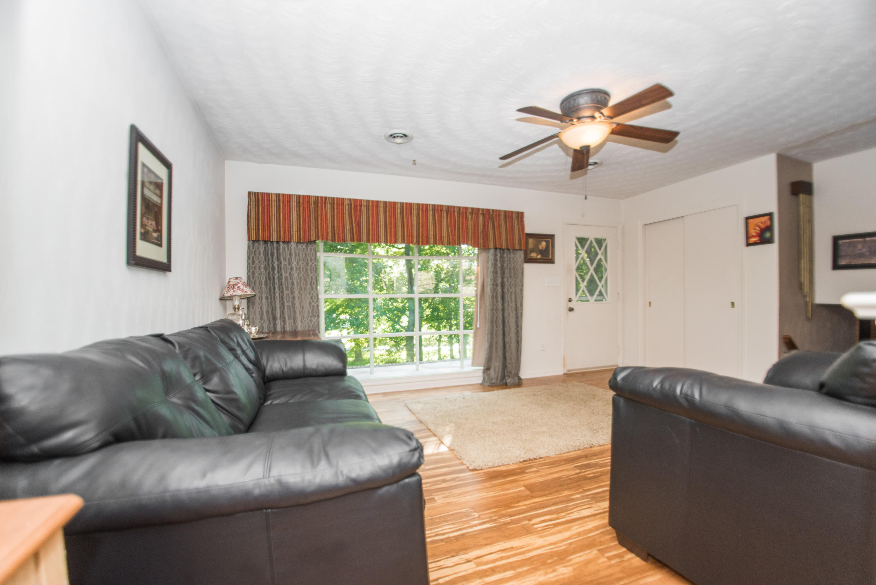 2524 Blue Ridge Springs Road Blue Ridge, VA 24064 - Photo 10 of 44 a living room with furniture and a large window