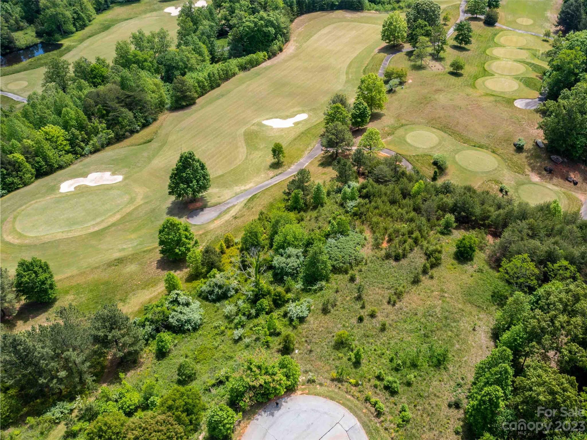 Lot 130 Cumberland Rd Mill Spring Mill Spring, NC 28756 - Photo 3 of 5 an aerial view of a residential houses