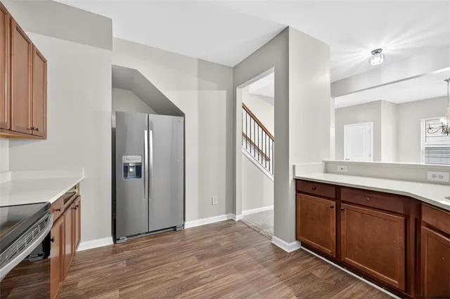 a view of a kitchen from the hallway