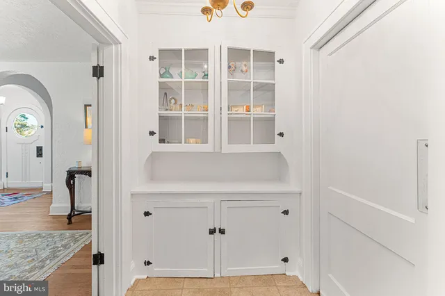 a view of a livingroom with furniture window and wooden floor
